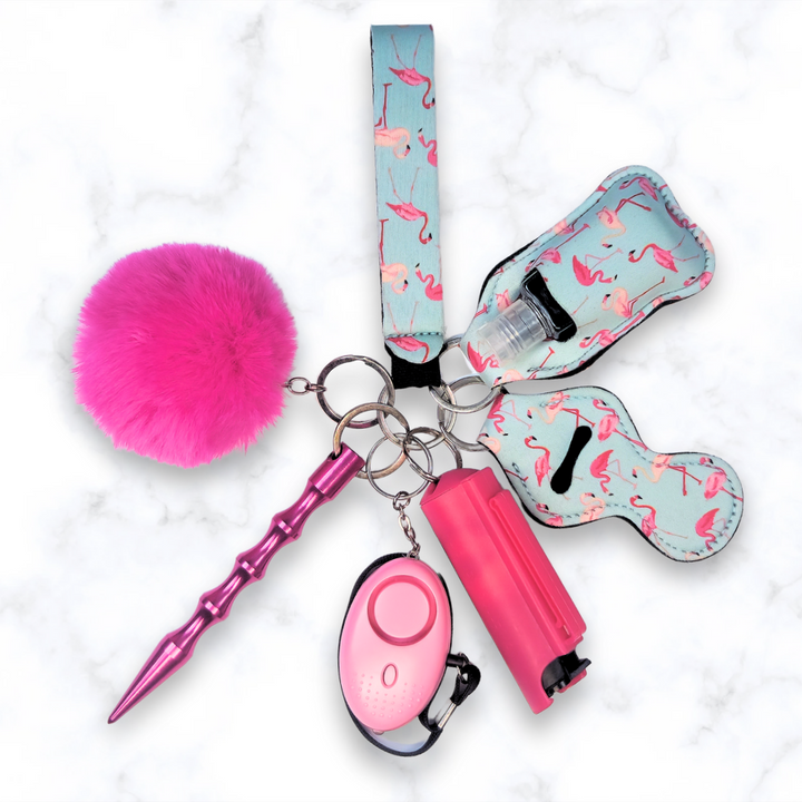 Pink flamingo safety keychain set with kubaton and pepper spray. 