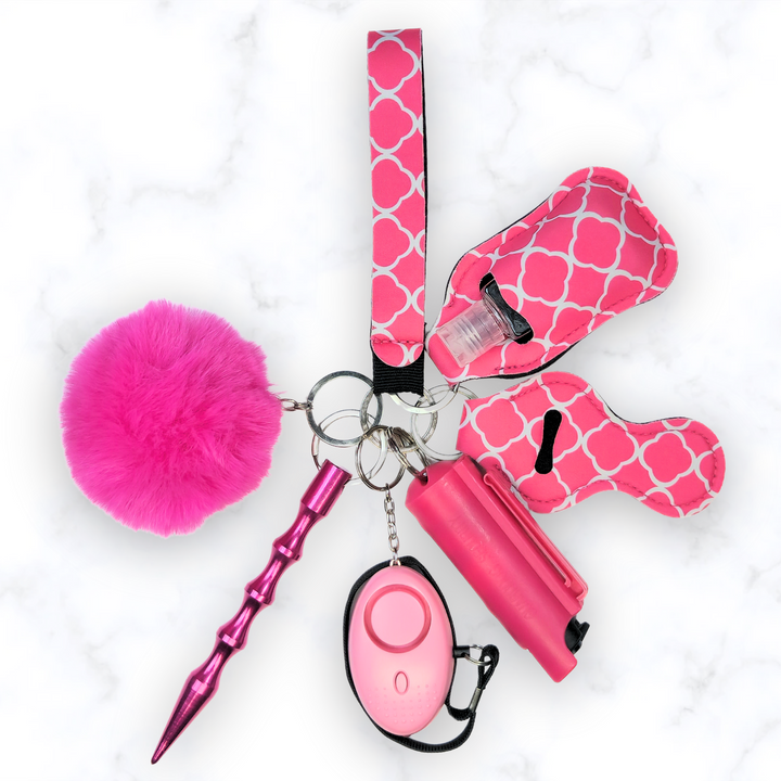 Hot pink safety keychain set with pepper spray and pom pom