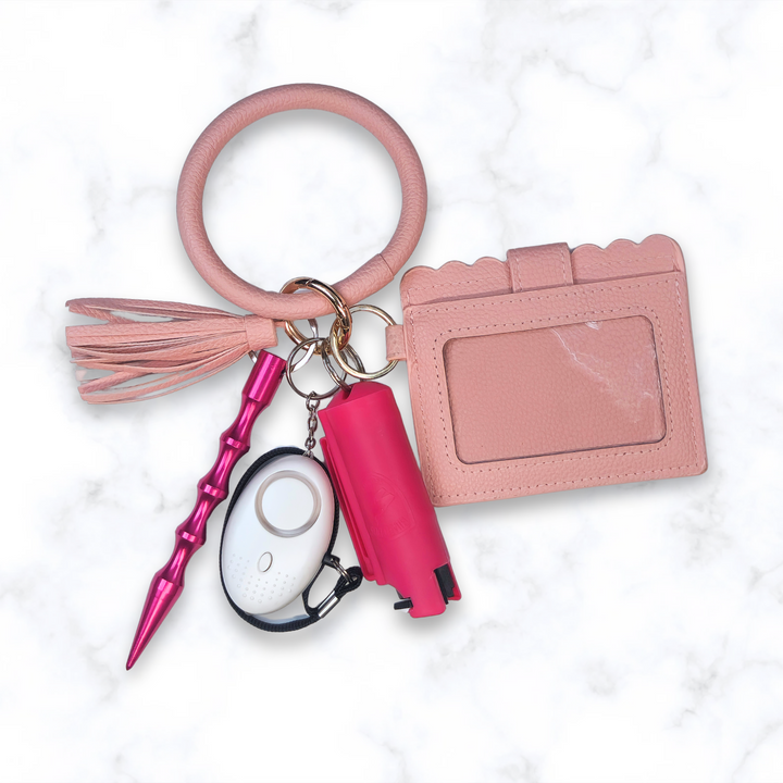 Pink bangle bracelet safety keychain set with wallet and panic alarm.