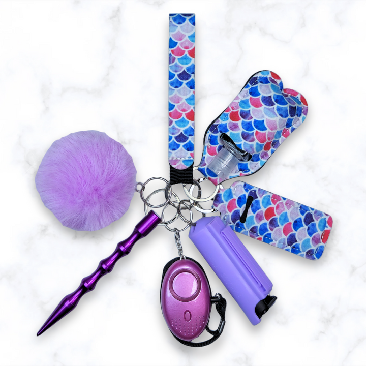 Purple mermaid safety keychain set with pepper spray,alarm, and pom pom.